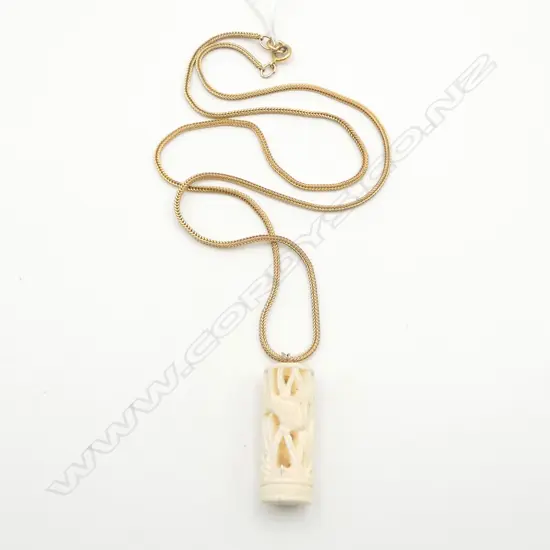 IVORY FISH CARVED PENDANT ON R/GOLD CHAIN
