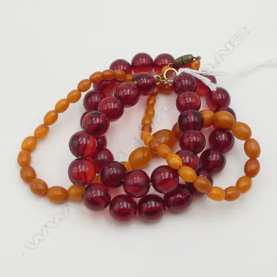 STRING OF BALTIC AMBER ? BEADS & STRING OF AMBER RESIN BEADS