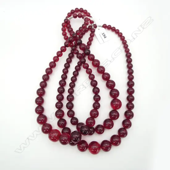 3 STRINGS CHERRY COLOURED GRADUATING BEADS
