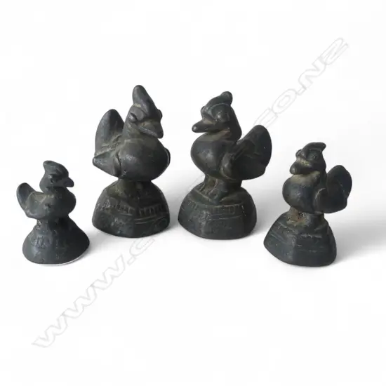 GRADUATED SET OF FOUR BRONZE ORNAMENTS H.70mm