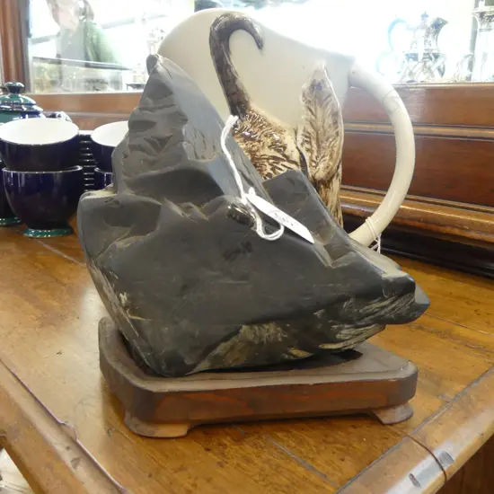 Japanese suikseki bonseki (Nishiki stone) scholars rock. Mountainous peaked form. On stand. H.175mm.