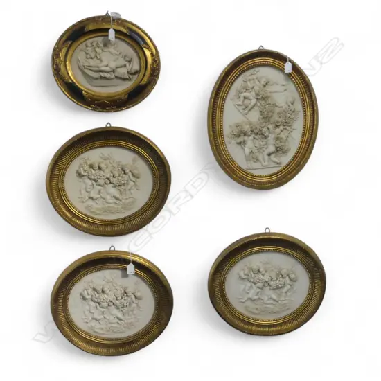 FIVE DECORATIVE COMPOSITE PANELS DEPICTING PUTTI AND NUDES ALL IN GILT FRAMES (500 X 380mm largest piece)