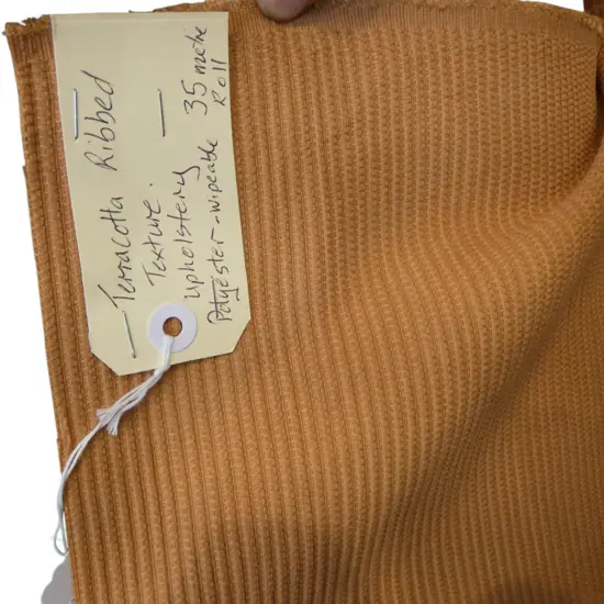 FABRIC BOLT; TERRACOTTA RIBBED TEXTURE UPHOLSTERY, 35M