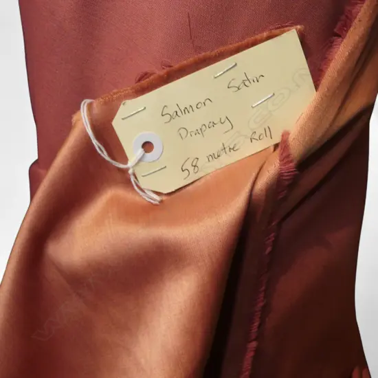 FABRIC BOLT; SALMON SATIN DRAPERY, 58M