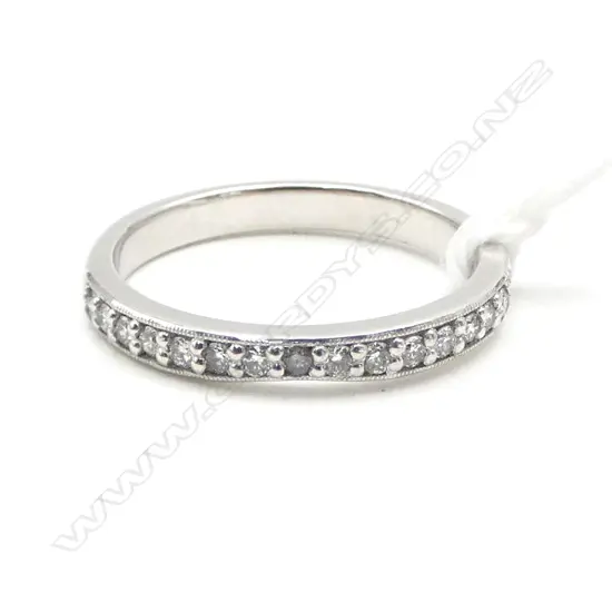 9CT WHITE GOLD AND DIAMOND BAND SIZE O½