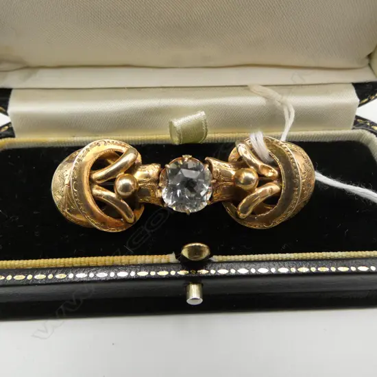 VICTORIAN EUTRUSCAN  (testing 14ct) GOLD GILT FANCY BROOCH with lge clear stone 6.65gms.