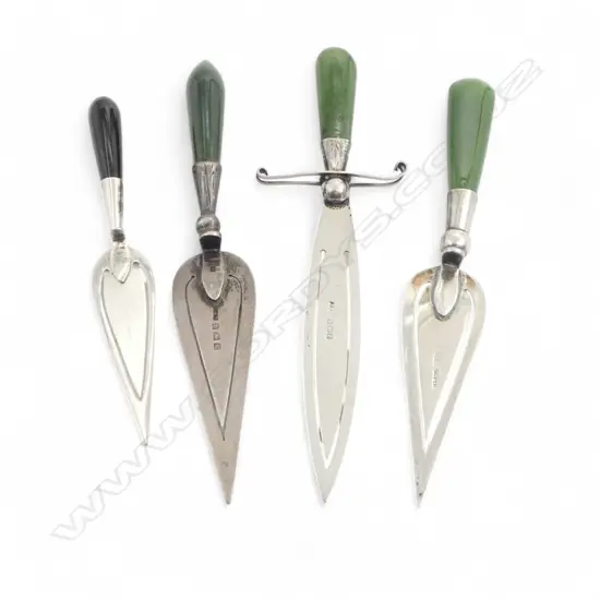 Four silver and pounamu handled page makers: sword etc