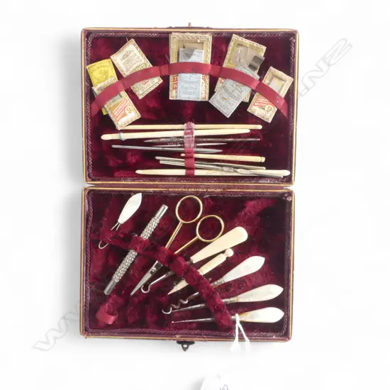 EDWARDIAN LEATHER CASED SEWING SET: various implements + scissors + needles etc