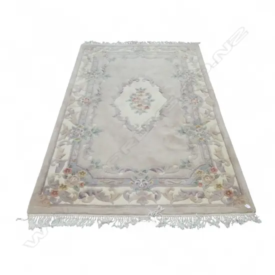 A CHINESE WOOL RUG PINK AND IVORY TONES 1500 x 2400mm