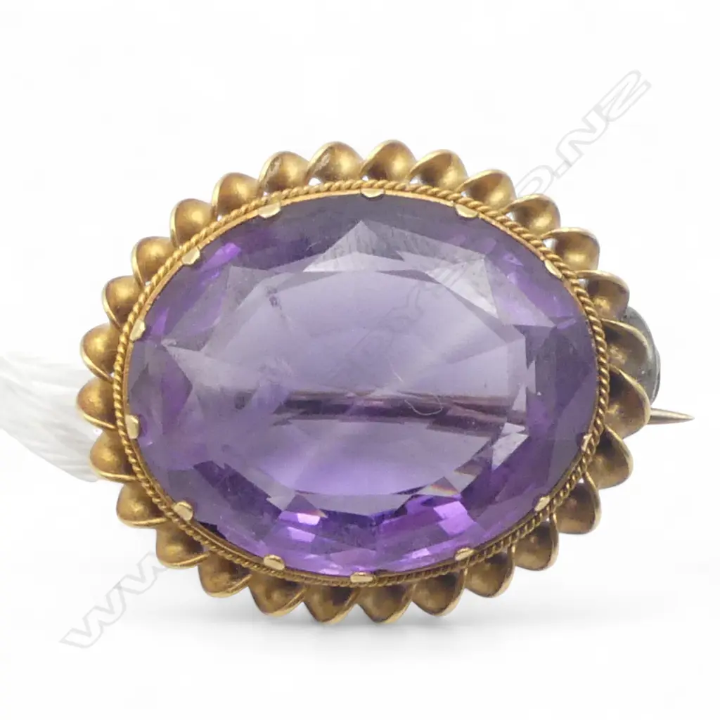 9CT GOLD AND AMETHYST BROOCH with valuation, repairs Image 1++