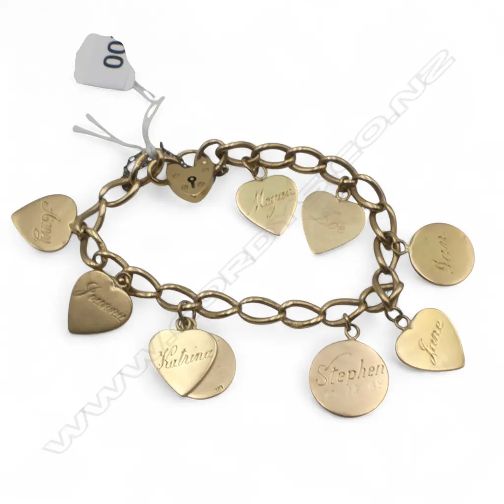 9ct BRACLET w. 9 CHARMS 38.9gms Image 1++