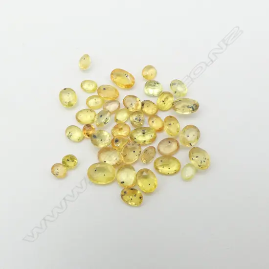 12ct OVAL CUT YELLOW SAPPHIRES INCLUSIONS THROUGHOUT