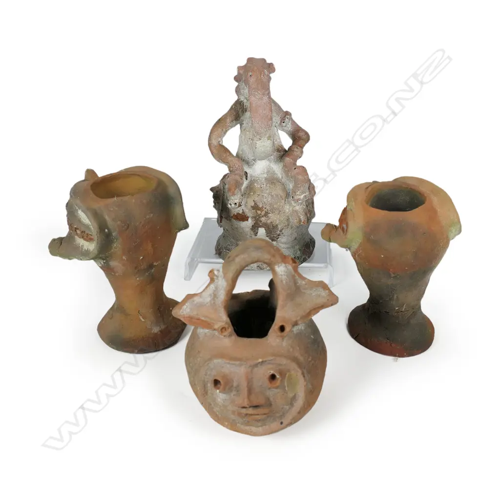 Four archaic style terracotta face pots, Image 1++