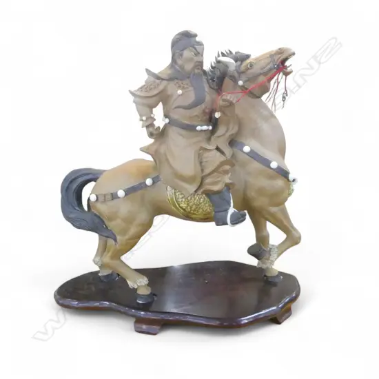 LGE CHINESE SHIWAN POTTERY SCULPTED EMPORER WARRIOR ON HORSE BACK well modelled expressive features. H.525mm. L.520mm