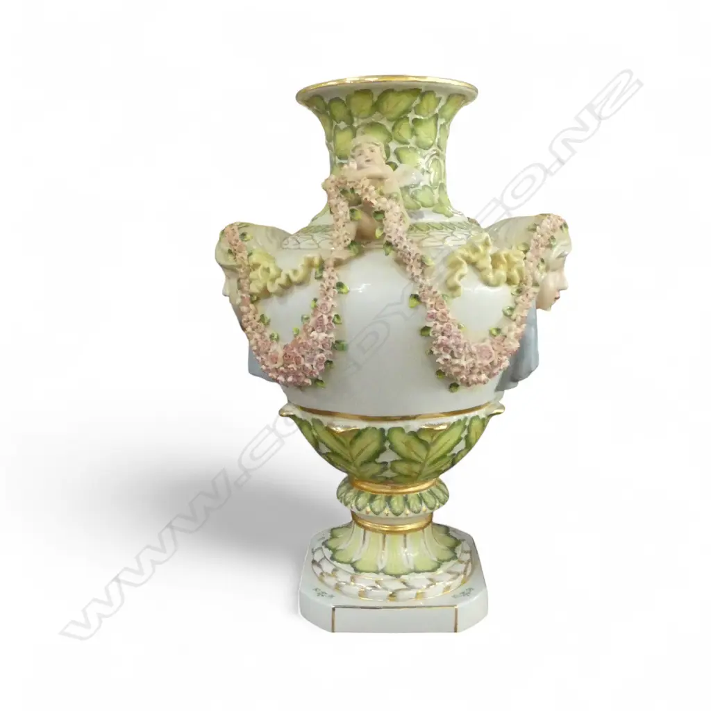 A DRESDEN STYLE VASE MODELLED IN THE 19TH CENTURY MANNER WITH PUTTI AND FLORAL SWAGS 535 mm (H) Image 1++
