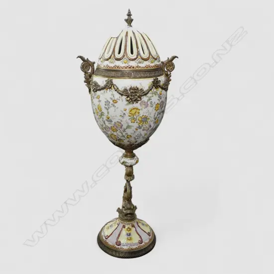 A TALL WONG LEE OVOID SHAPED POT POURII URN WITH FLORAL SWAGS RAISED ON A BRONZE DOLPHIN  PEDISTAL 880mm (H)