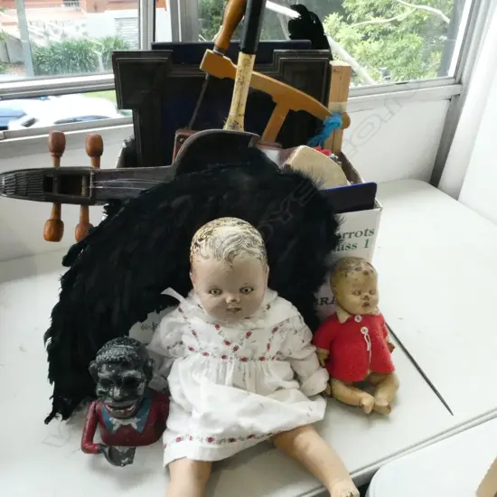 ASST. ITEMS; BLACK FEATHER WINGS, BABY DOLL, TENNIS RACKET ETC