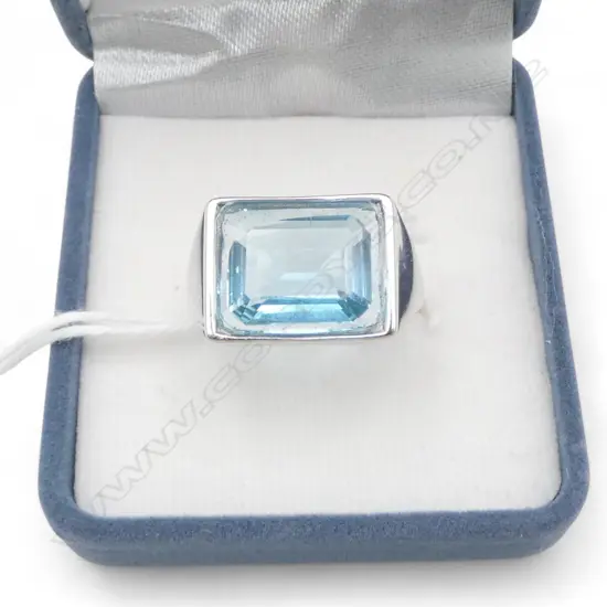 SILVER  & BLUE TOPAZ RING, adjustable size, stone glued in, AIG report