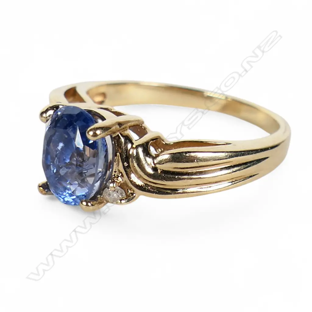A 9ct gold sapphire and diamond ring, Image 1++