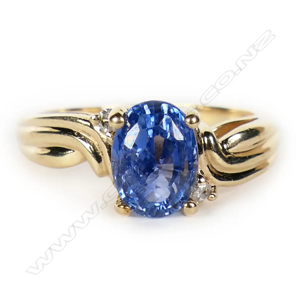 A 9ct gold sapphire and diamond ring, Image 1++