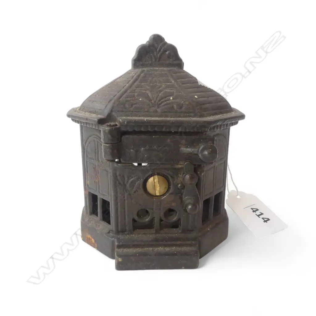 OLD CAST IRON MECHANICAL BANK 'SNAP IT' by H.L. JUDD. HEXAGONAL form. The sprung pull open door with latch. H.100mm Image 1++