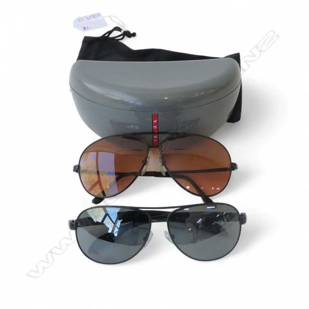 2 AVIATOR SUNGLASSES; PRADA & SERENGETI, BOTH CASED Image 1++