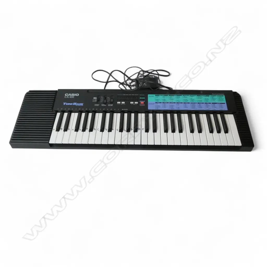 CASIO CA/100 TONE BANK ELECTRIC KEYBOARD WITH CORD Image 1++