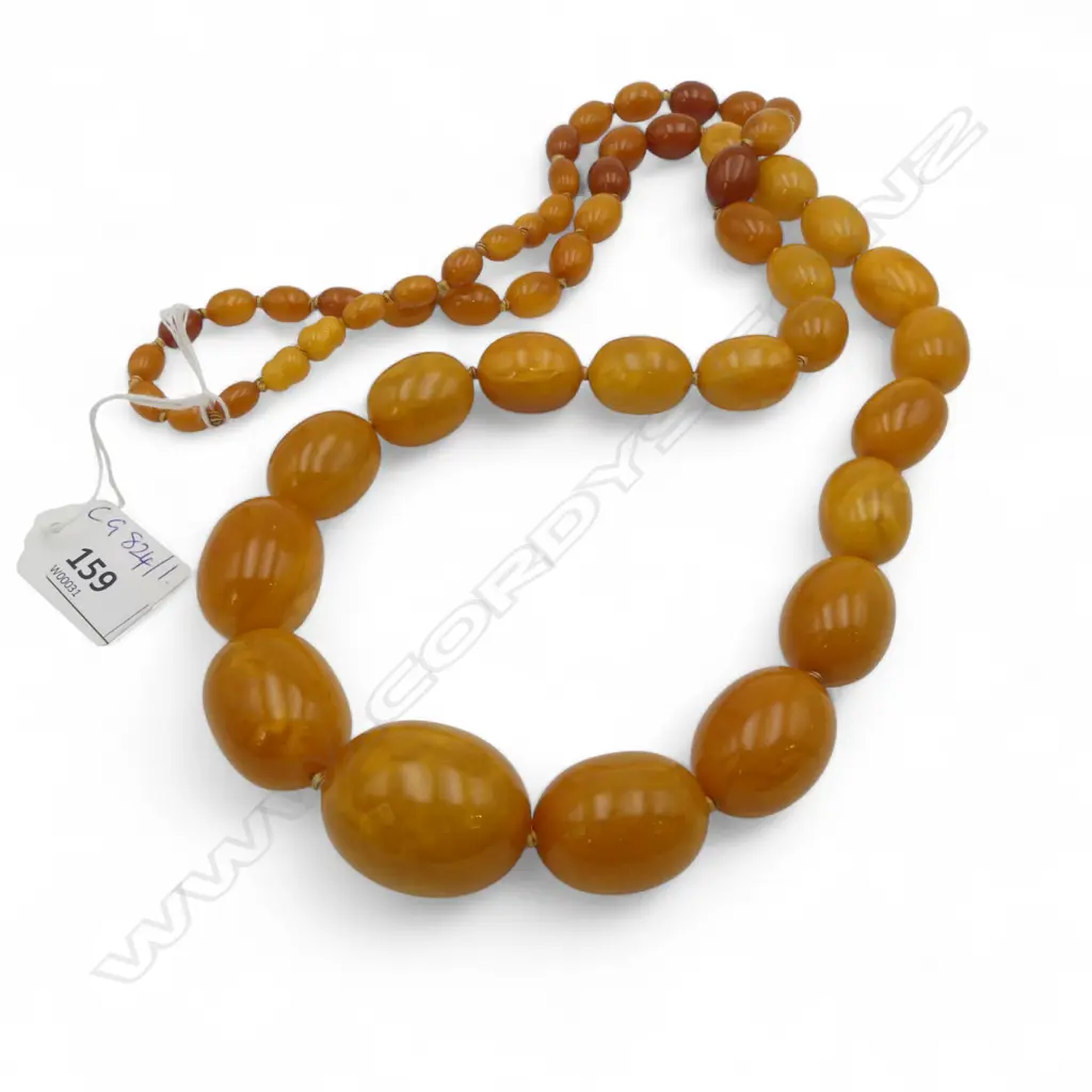 QUALITY LONG VINTAGE AMBER GRADUATING BEAD NECKLACE - EGG YOLK TONE - KNOTTED BETWEEN EACH BEAD Image 1++