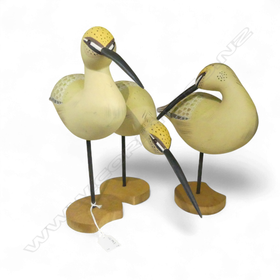 THREE CARVED & PAINTED WOOD BIRD ORNAMENTS. Tallest 300mm