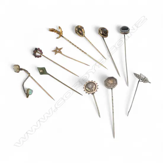 A good collection of 11 assorted 9ct gold & silver stick pins: opal + greenstone + pearls etc