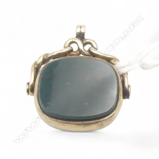 c.1900 9ct SPINNER  bloodstone & carnelian panels. Twisting frame. 6.gms