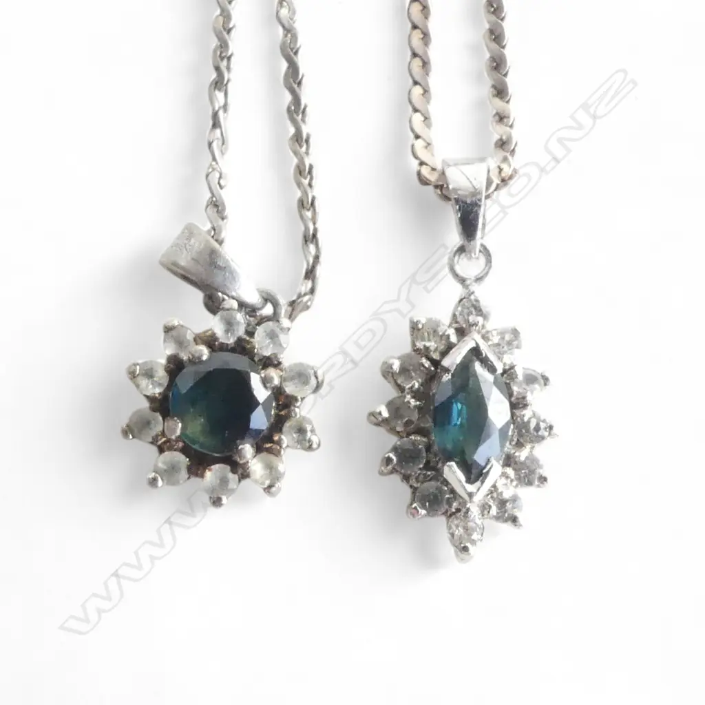 2 SAPHIRE & WHITE STONE PENDANTS ON SILVER CHAINS Image 1++