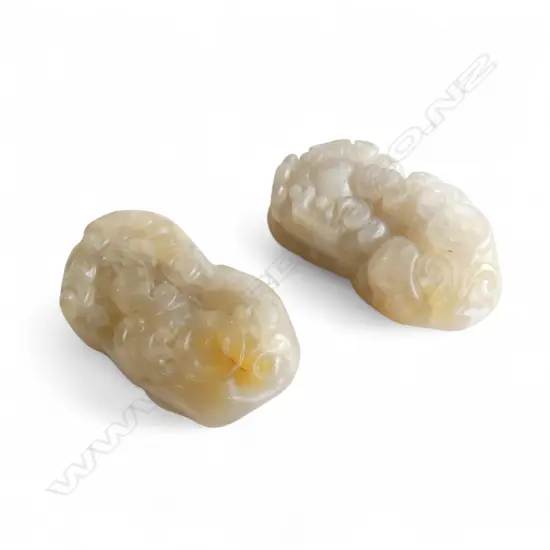 2 CARVED JADE? LION PENDANTS L.45mm