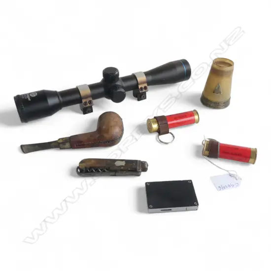 7 PCES; STOEGER 4x32 SCOPE, 2 PURDEY BULLET KEYCHAINS, PIPE, POCKET KNIFE, PORSCHE LIGHTER, HORN CUP