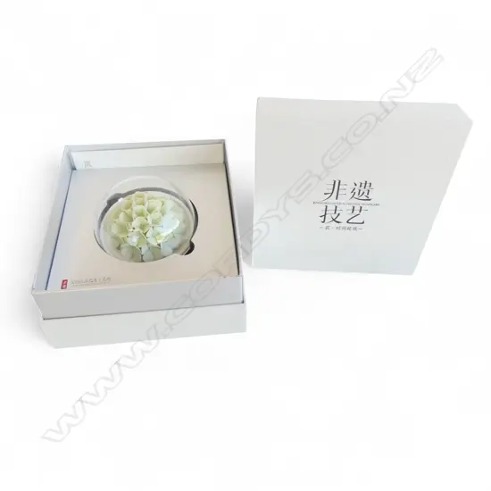 CASED CHINESE FLOWER ORNAMENT 