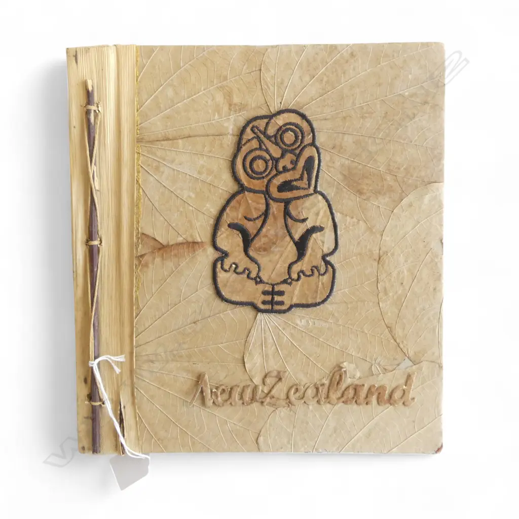 VINTAGE NEW ZEALAND TIKI ALBUM constructed of natural fibres. Fault to 'N' 280x255mm Image 1++