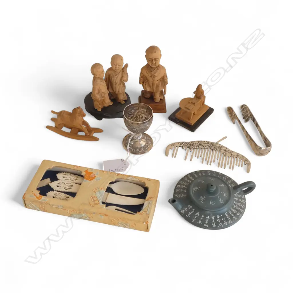 9 ASST. ORIENTAL ITEMS; 4 WOOD CARVINGS, TEAPOT, 3 PCE CUTLERY SET, 3 PCES SILVER TONE METAL Image 1++