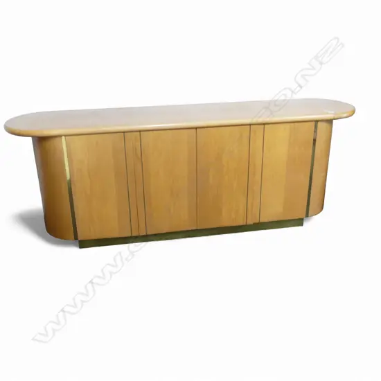 1990's designer SIDEBOARD long low form. Pale timber with gilt metal banded highlights. L.2070mm. h.740mm