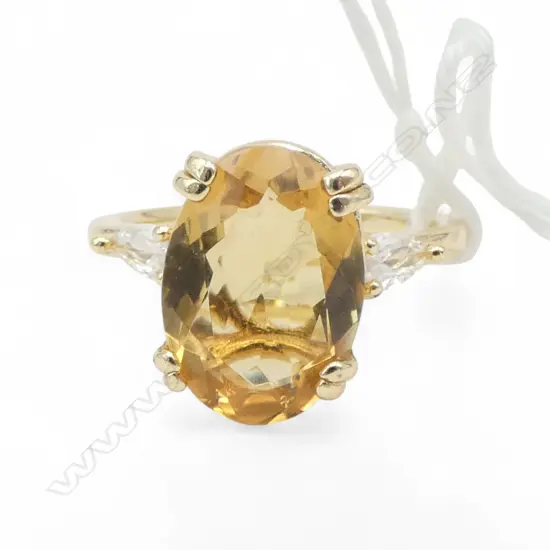 OVAL CITRINE DRESS RING, GOLD PLATED, AIG REPORT SIZE Q