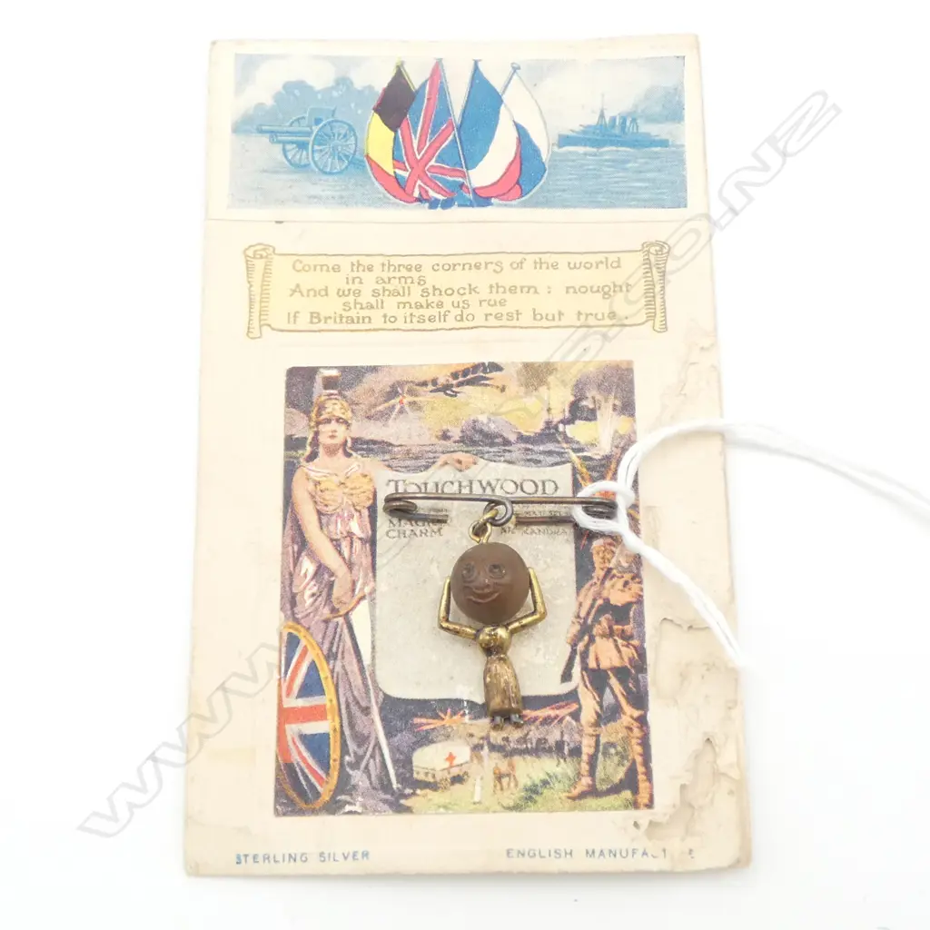 WWI ‘Touchwood’ Queen Alexandra lucky silver and wood charm with original printed card backing - minor insect damage Image 1++