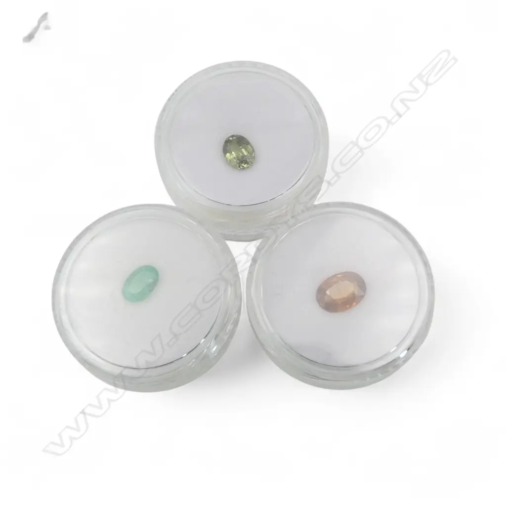 3 OVAL CUT GEMSTONES; EMERALD, GREEN SAPPHIRE & ZIRON Image 1++