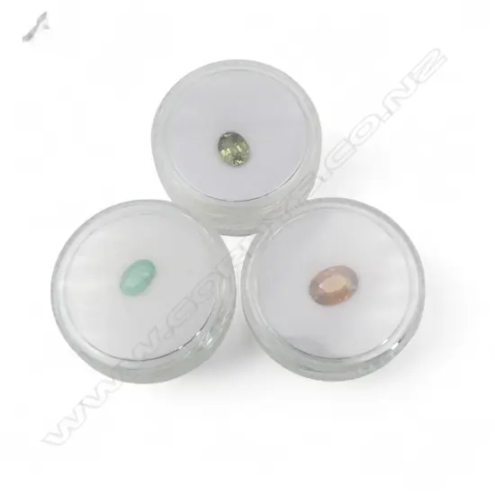 3 OVAL CUT GEMSTONES; EMERALD, GREEN SAPPHIRE & ZIRON
