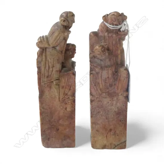 2 OLD CHINESE CARVED SOAPSTONE CHOP TYPE SCULPTURES with figures. Red toned. H.135mm