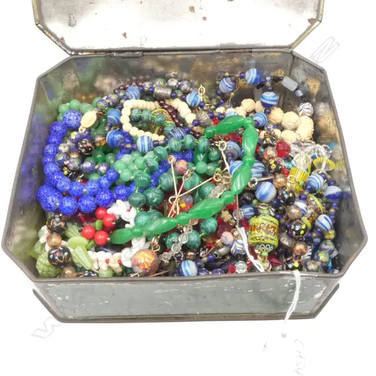 VINTAGE CUPIDS TIN WITH LARGE COLLECTION OF GLASS & OTHER BEAD NECKLACES