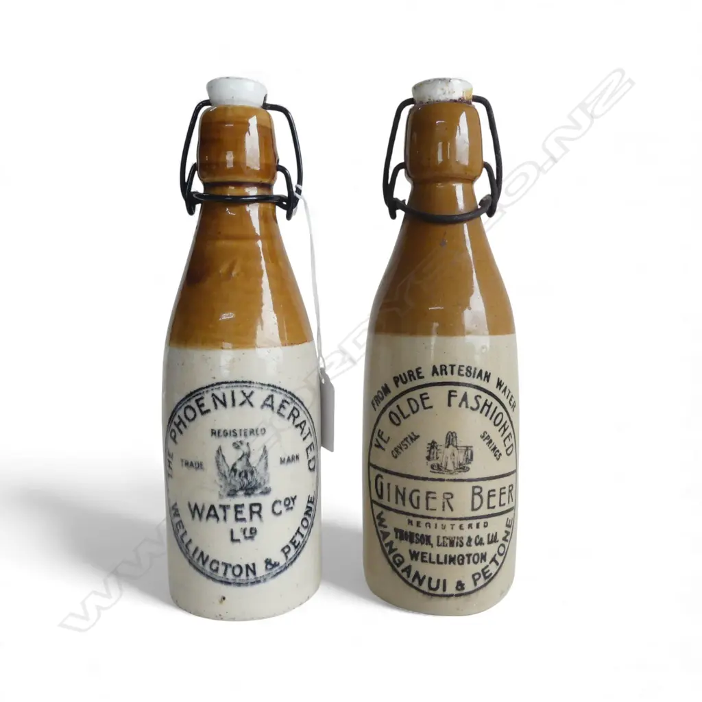 2 VINTAGE N.Z. STONEWARE BOTTLES; 'YE OLDE FASHIONED GINGER BEER' + 'PHOENIX AERATED WATER' H.220mm Image 1++