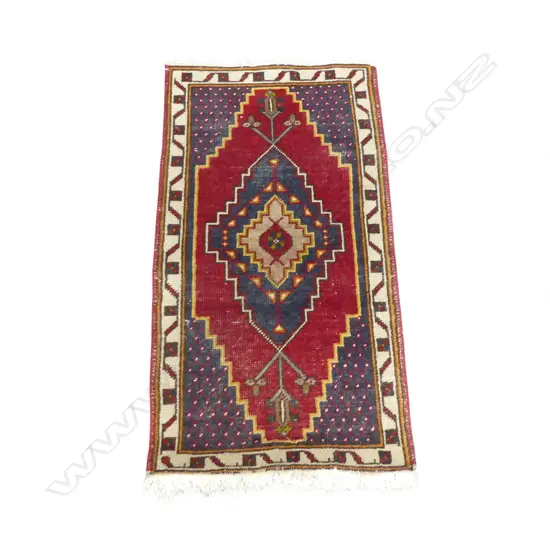 HAND KNOTTED WOOL PILE RUG 980x510mm