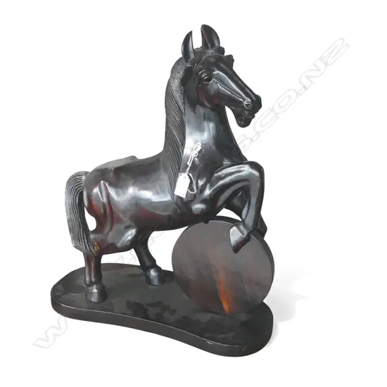 SOLID EBONY REARING HORSE with disc under front legs H.534mm
