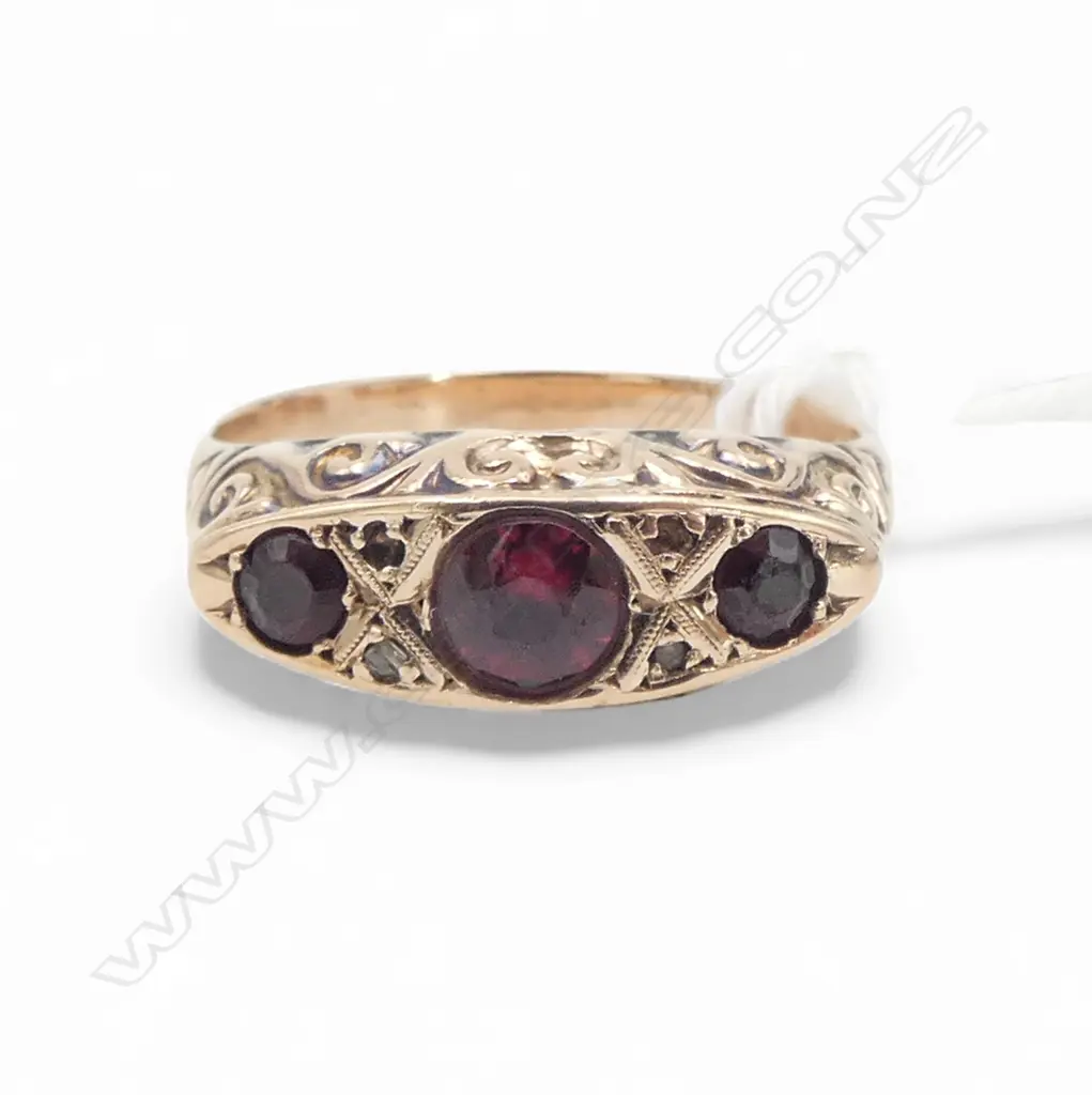 9CT ROSE GOLD AND GARNET RING 2.23gms SIZE N1/2 Image 1++