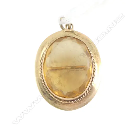 VINTAGE 9ct GOLD FRAMED oval faceted yellow/amber toned GEMSTONE PENDANT / BROOCH 6.2gms