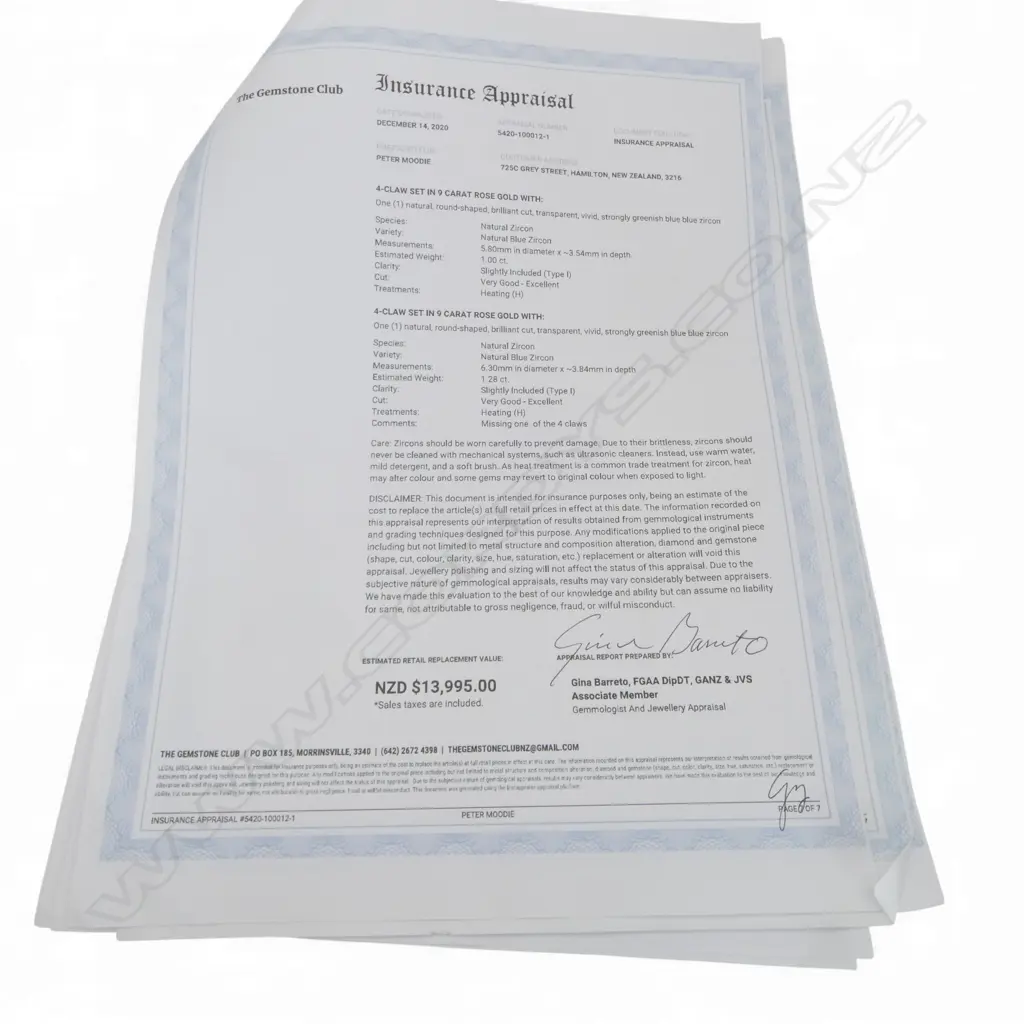 9CT GOLD BLUE AND WHITE ZIRCON BROOCH (one stone absent) with valuation Image 1++